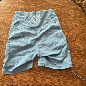 Gymshark legacy fitted shorts with rusching. Size small in light blue